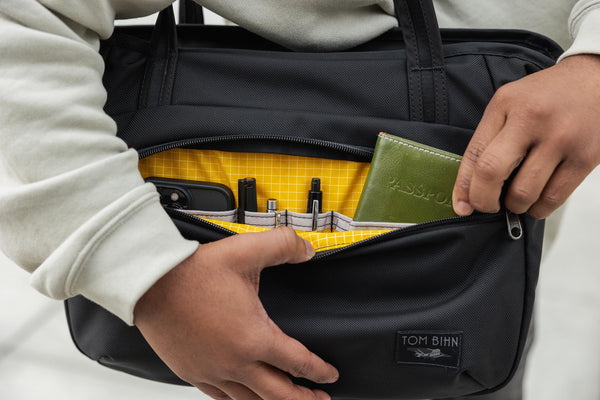 A nomade showing the pockets in its front compartment.
